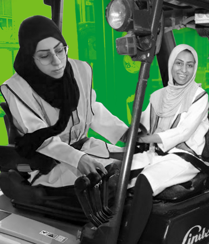 Saudi women working as forklift operators