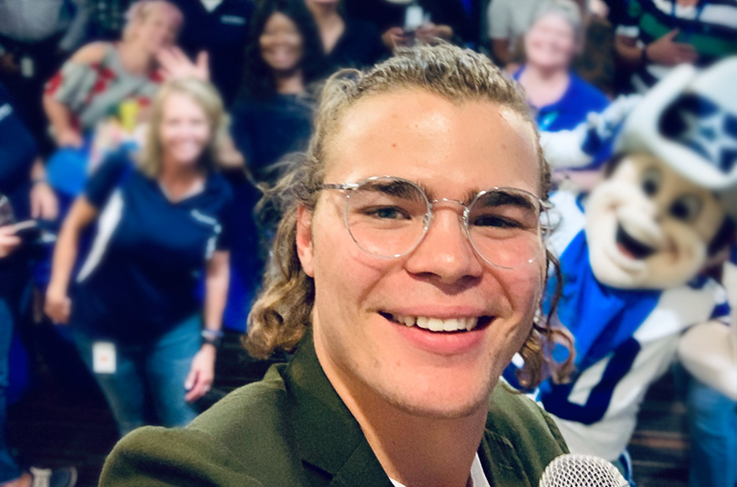 Austin taking a selfie at a company event in Plano